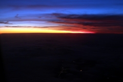 Sonnenuntergang über den Wolken